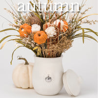 White Ceramic Canister w/Lid and  5 Interchangeable Metal Seasonal/Decor Magnets.