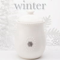 White Ceramic Canister w/Lid and  5 Interchangeable Metal Seasonal/Decor Magnets.